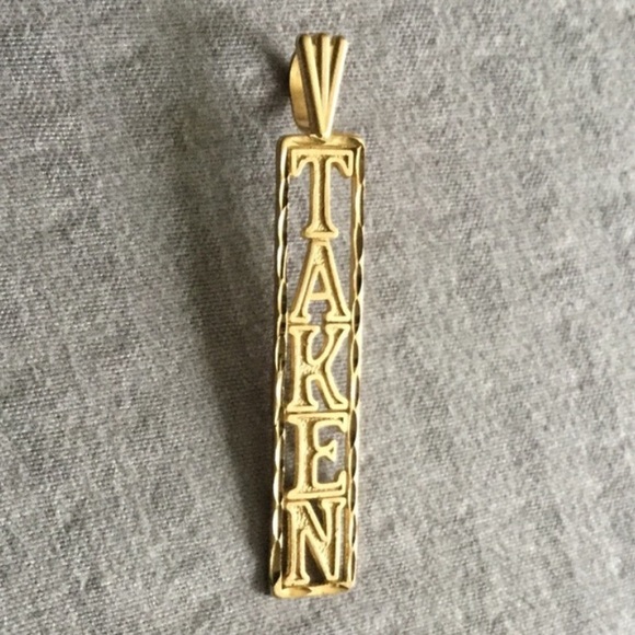 Other - 14K gold “Taken” charm says LOVE.